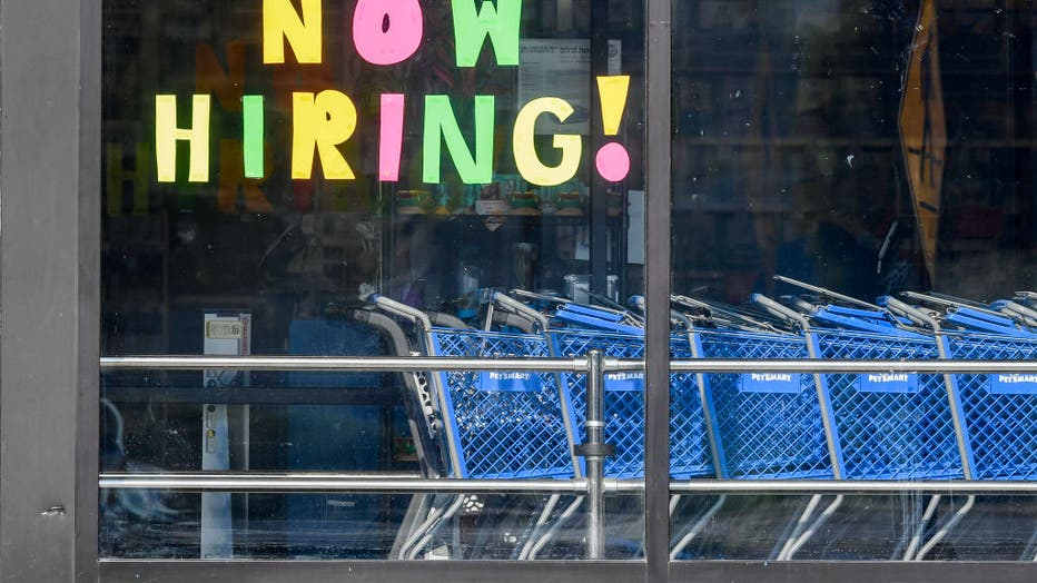 Help Wanted Sign In Store Window In Muhlenberg Pennsylvania