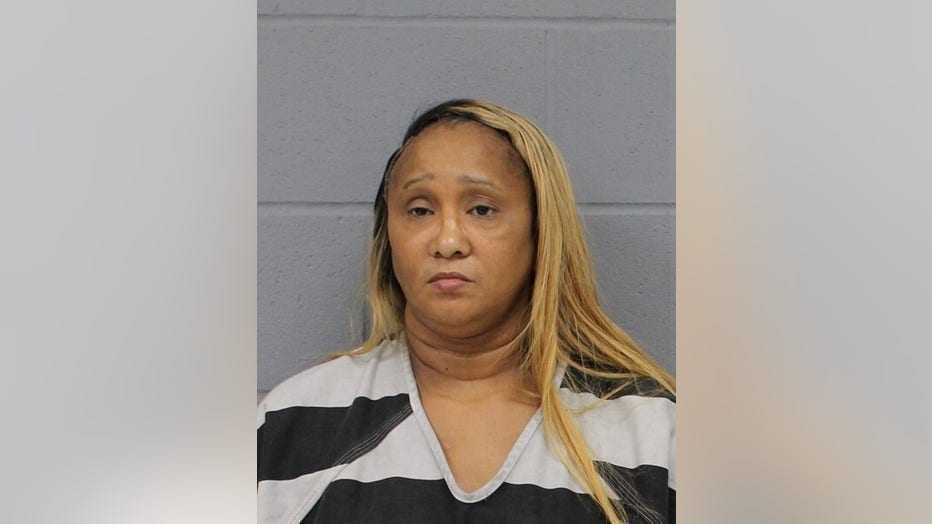 Meeka Poteek Baker had multiple fraud-related felony warrants out of several states, according to police.