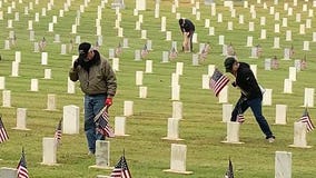 Flags placed on graves at Texas State Cemetery ahead of Veterans Day