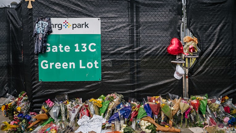 HOUSTON, TEXAS - NOVEMBER 09: A memorial to those who died at the Astroworld festival is displayed outside of NRG Park on November 09, 2021 in Houston, Texas. Eight people were killed and dozens injured last Friday in a crowd surge during a Travis Scott concert at the Astroworld music festival. Several lawsuits have been filed against Scott, and authorities continue investigations around the event. Scott, a Houston-native rapper and musician, launched the festival in 2018. (Photo by Brandon Bell/Getty Images)