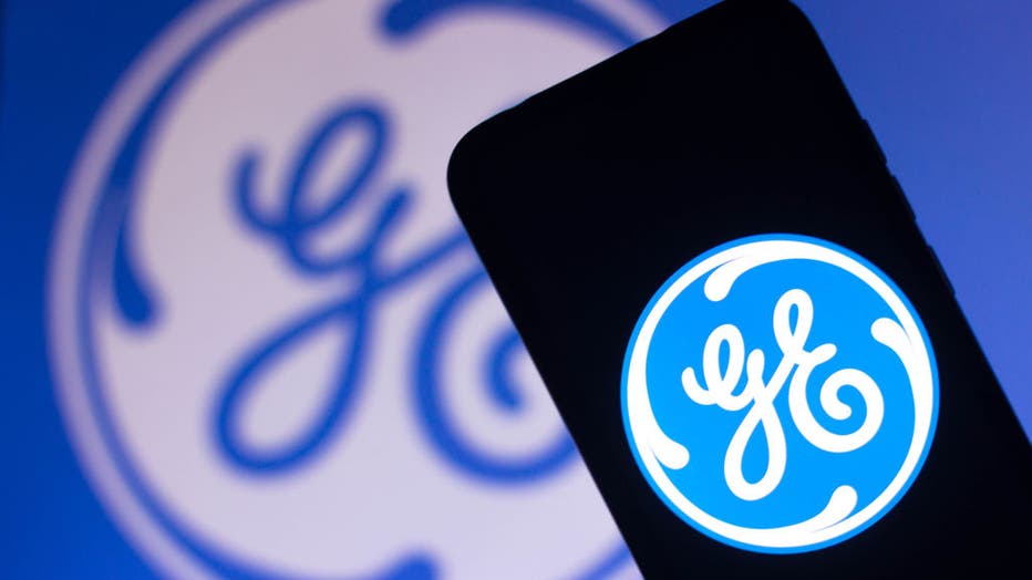 In this photo illustration the General Electric (GE) logo