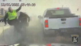 Idaho state trooper nearly rammed by pickup truck while helping stranded motorist: dashcam video