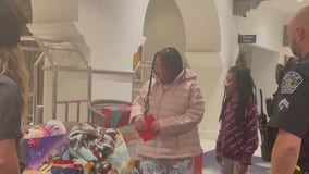 Mother, daughter receive gifts from officers who saved them from fire