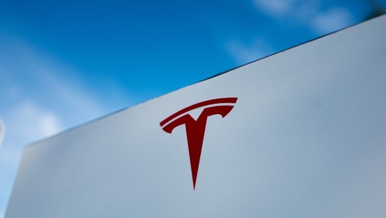 Close-up of Tesla Motors logo against a bright blue sky in Pleasanton, California, July 23, 2018. (Photo by Smith Collection/Gado/Getty Images)