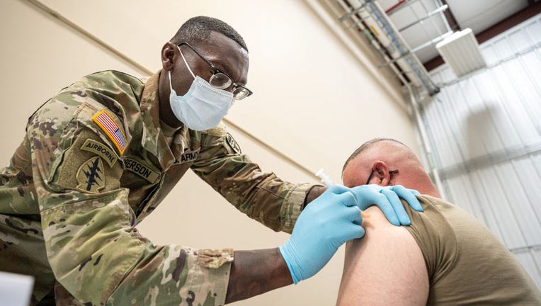 ab8b6ec0-U.S. Military Members Receive COVID-19 Vaccinations At Fort Knox