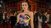 Olivia Culpo asked by American Airlines to put on a blouse ahead of flight