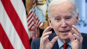 Biden urges schools to remain open amid COVID-19 case surge, orders 20M antiviral pills