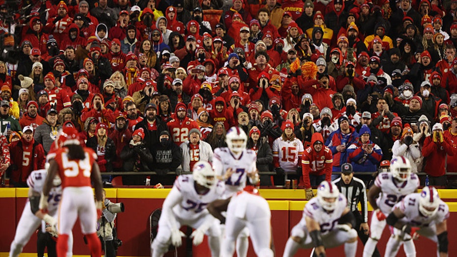 KANSAS CITY, MISSOURI - JANUARY 23: Kansas City Chiefs fans cheer during the game against the Buffalo Bills in the AFC Divisional Playoff game at Arrowhead Stadium on January 23, 2022 in Kansas City, Missouri. (Photo by Jamie Squire/Getty Images)