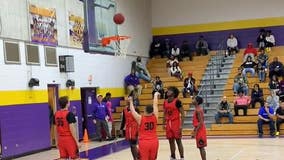 High school basketball team helps player with Down syndrome make game ending shot