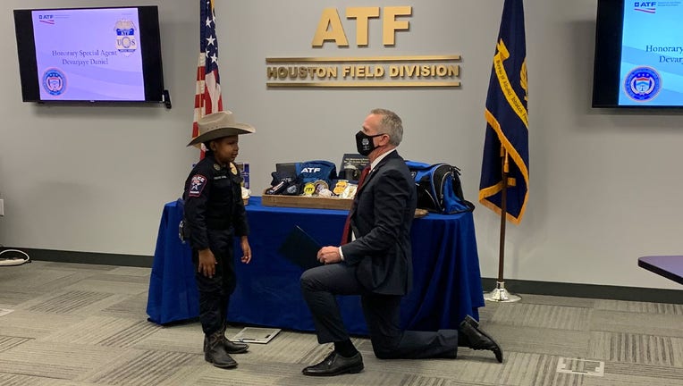 Devarnaye-being-sworn-in-as-honorary-ATF-agent.jpg