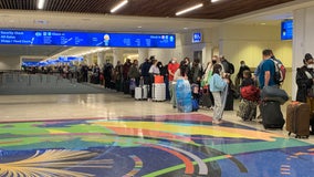 Hundreds stranded in Orlando airport after massive flight cancellations