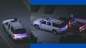 LA Police Chase: Passenger pops head out of SUV, possibly taunting cops before crash, arrest