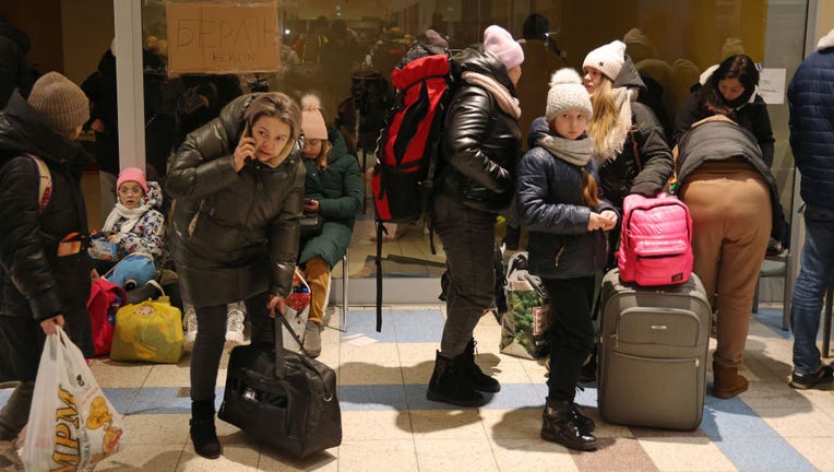 Ukrainian families leave country