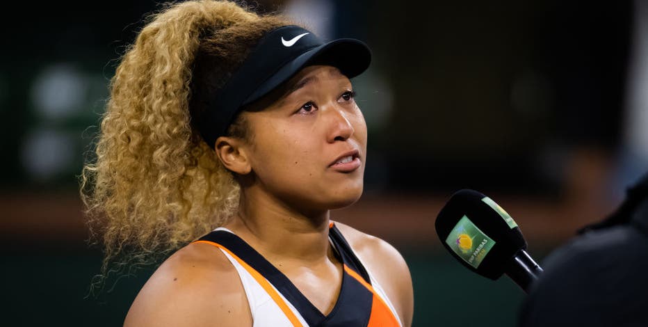 Naomi Osaka speaks to crowd through tears after heckling at Indian