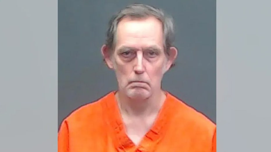 David McMichael, 67, is charged in connection with having human remains inside his home. He allegedly told New Boston, Texas police the remains were of his son, who died in 2018. (Bowie County jail)