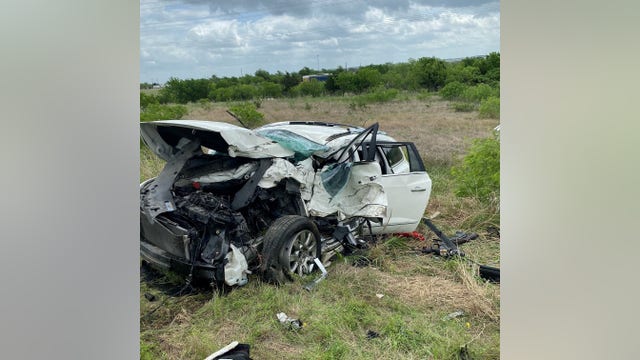 Two people pinned after two-vehicle crash involving semi, SUV