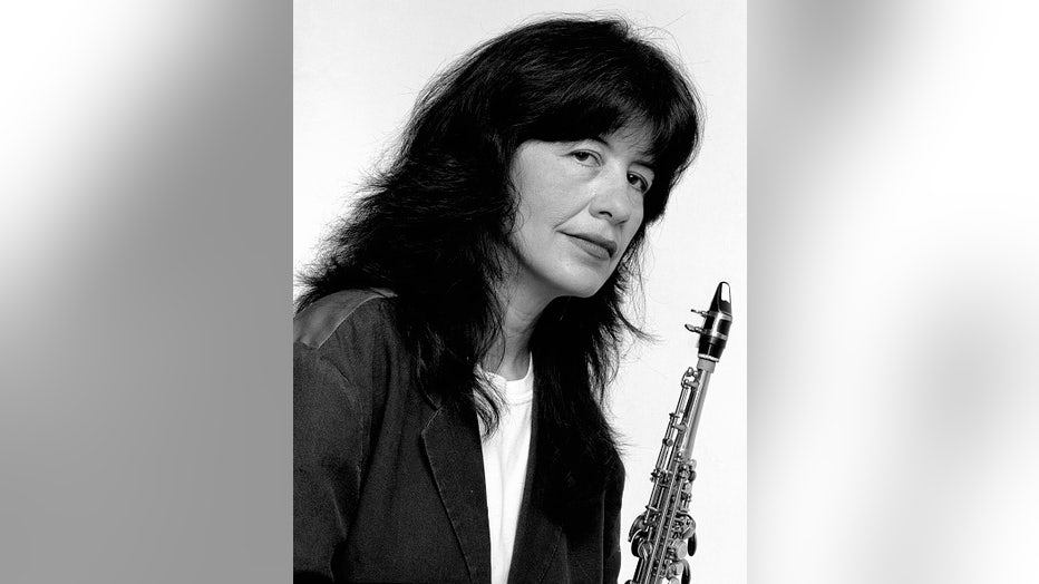 Portrait of Mvskoke Nation author, musician, poet (and future United States Poet Laureate) Joy Harjo as she poses with a saxophone, October 1996. (Photo by Jack Mitchell/Getty Images)