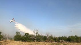 Crews make progress against destructive Texas wildfires