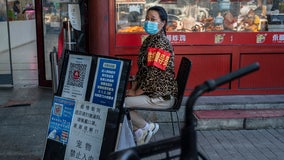 Beijing mandates COVID vaccines to enter some public spaces