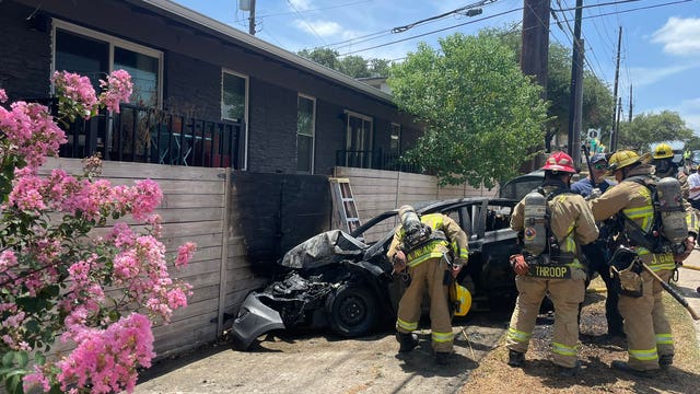 Two-car collision causes fire, street closure in South Austin