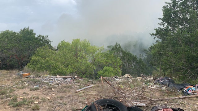 Smoke from illegal South Austin dump fire seen for miles