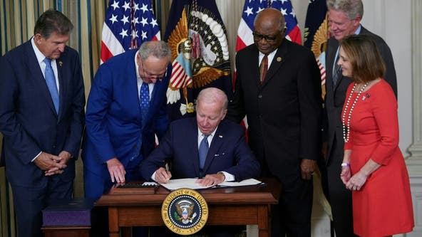 Inflation Reduction Act: Biden signs massive climate and health care bill
