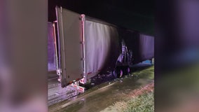 Tractor trailer carrying canned beverages catches fire on Highway 290