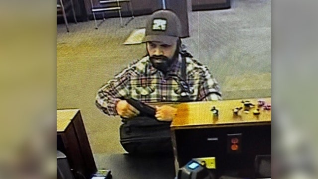 Armed robbery at South Austin bank, police looking for suspect