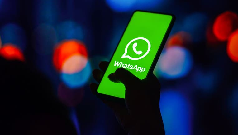 In this photo illustration, the WhatsApp logo is displayed