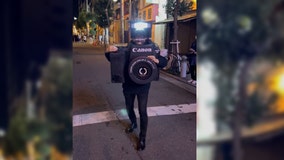 Photographer dresses in camera Halloween costume that actually takes, displays photos