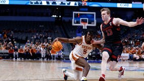 Carr helps No. 7 Texas beat Stanford 72-62 amid uncertainty