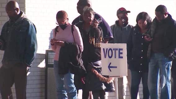 Group to deploy armed guards near Georgia polling places during Senate runoff
