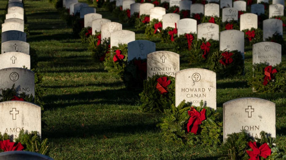 Volunteers Place Holiday Wreaths On Arlington National Cemetery Headstones