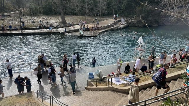 Austin residents splash into the new year at Barton Springs Pool