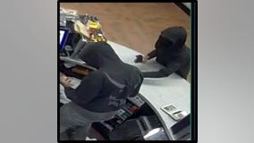 Police searching for 2 armed robbery suspects in Buda