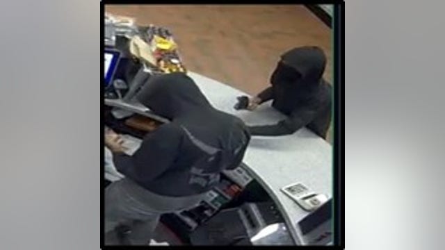 Police searching for 2 armed robbery suspects in Buda