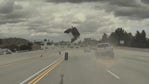 WATCH: Tire pops off truck, causes car to flip on Chatsworth freeway