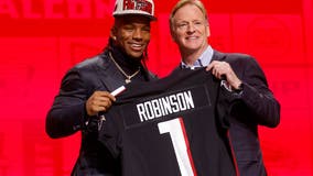 Falcons keep first-round focus on offense, take RB Robinson
