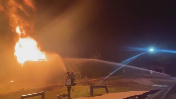 VIDEO: Large oil tank catches fire in Caldwell County