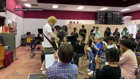 Ed Sheeran surprises students at Middleton High School with free concert tickets, guitars