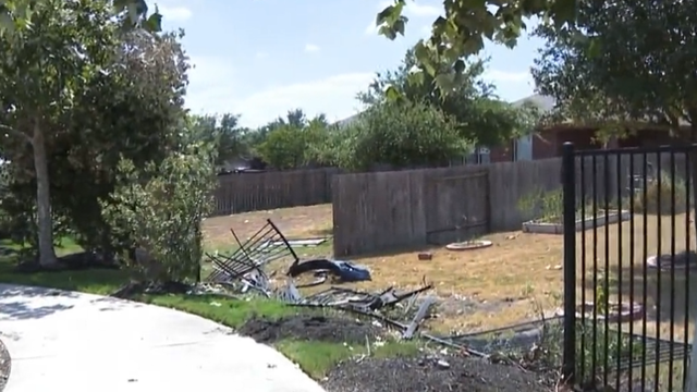 Minivan plows through several backyards in Buda