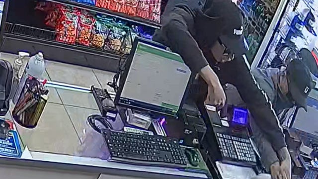 Two suspects rob Manor business at gunpoint: police