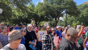 Public education advocates rally against school vouchers at Capitol