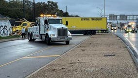 18-wheeler hits building on I-35 service road