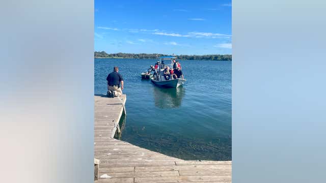 3 adults, 1 child rescued from lake after boat capsizes in Fayette County