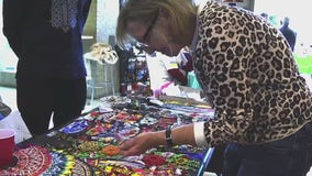 Refugees from Ukraine, Afghanistan sell crafts at YMCA holiday bazaar