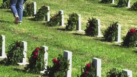 Volunteers, Gov. Abbott lay wreaths on graves at Texas State Cemetery