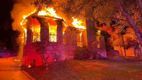 Smoke alarm saves family of 4; house a total loss