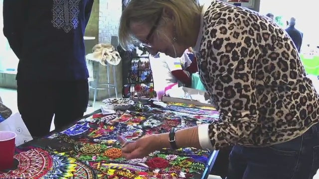 Refugees from Ukraine, Afghanistan sell crafts at YMCA holiday bazaar