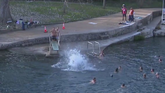 Hundreds start new year with cold plunge